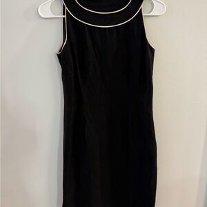 Elegant Black Dress with White Trim
